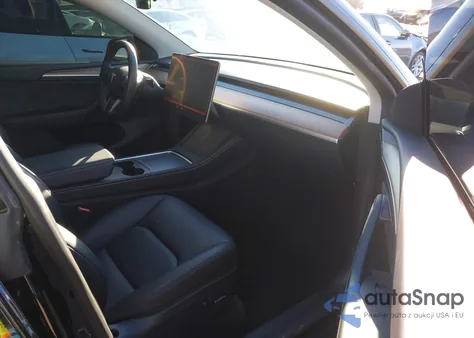 2023 Tesla Model Y из США, поврежденный, VIN 7SAYGDEF3PF759288